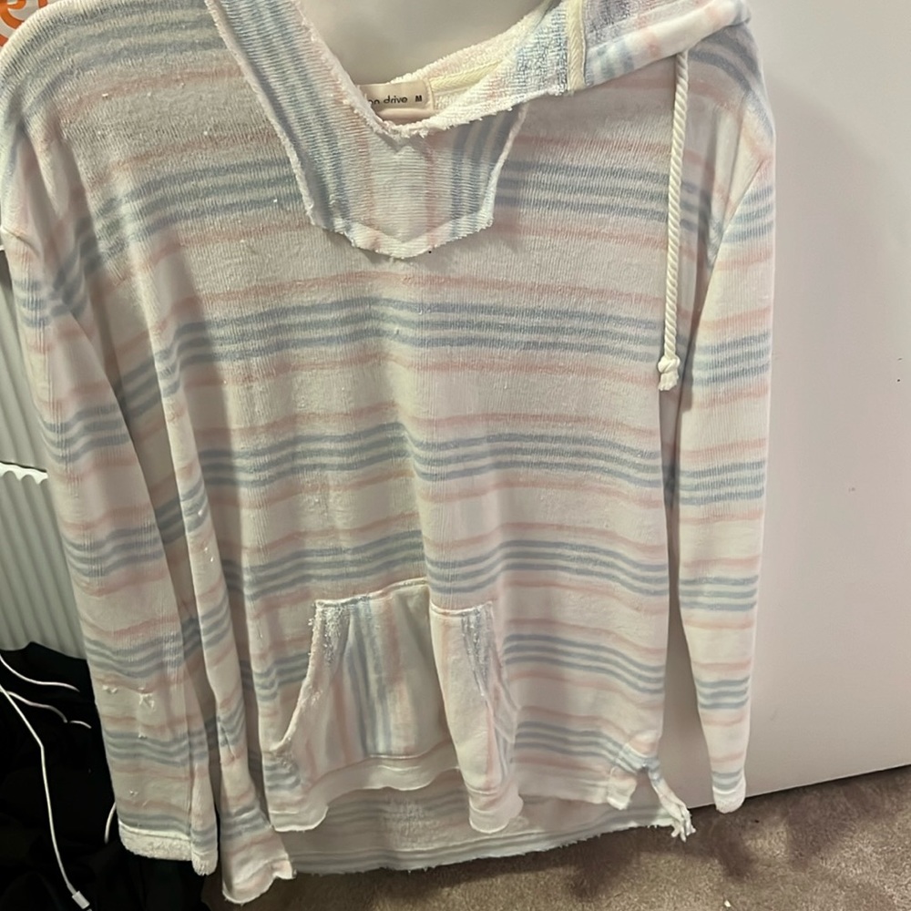 White,pink and blue hoodie. Towel material. Brand new with tags.